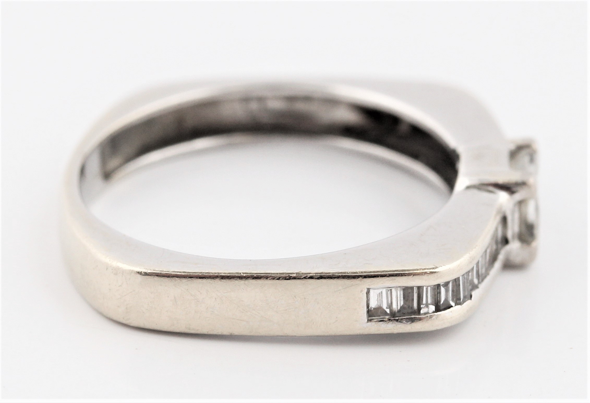 A hallmarked 18ct white gold diamond ring, set with a principal princess cut diamond measuring - Image 3 of 4