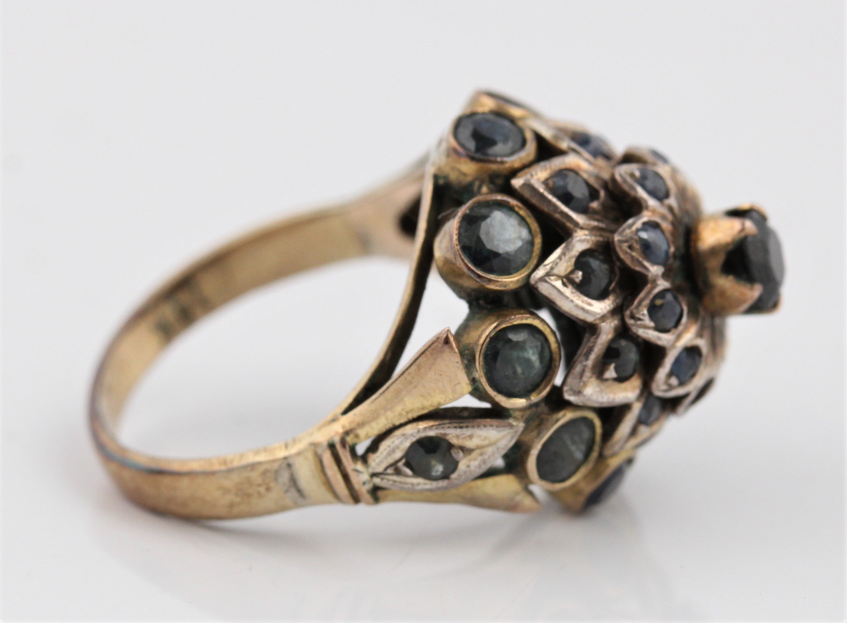 (WITHDRAWN) A tiered sapphire cluster ring, stamped 14k, ring size J½. - Image 4 of 5