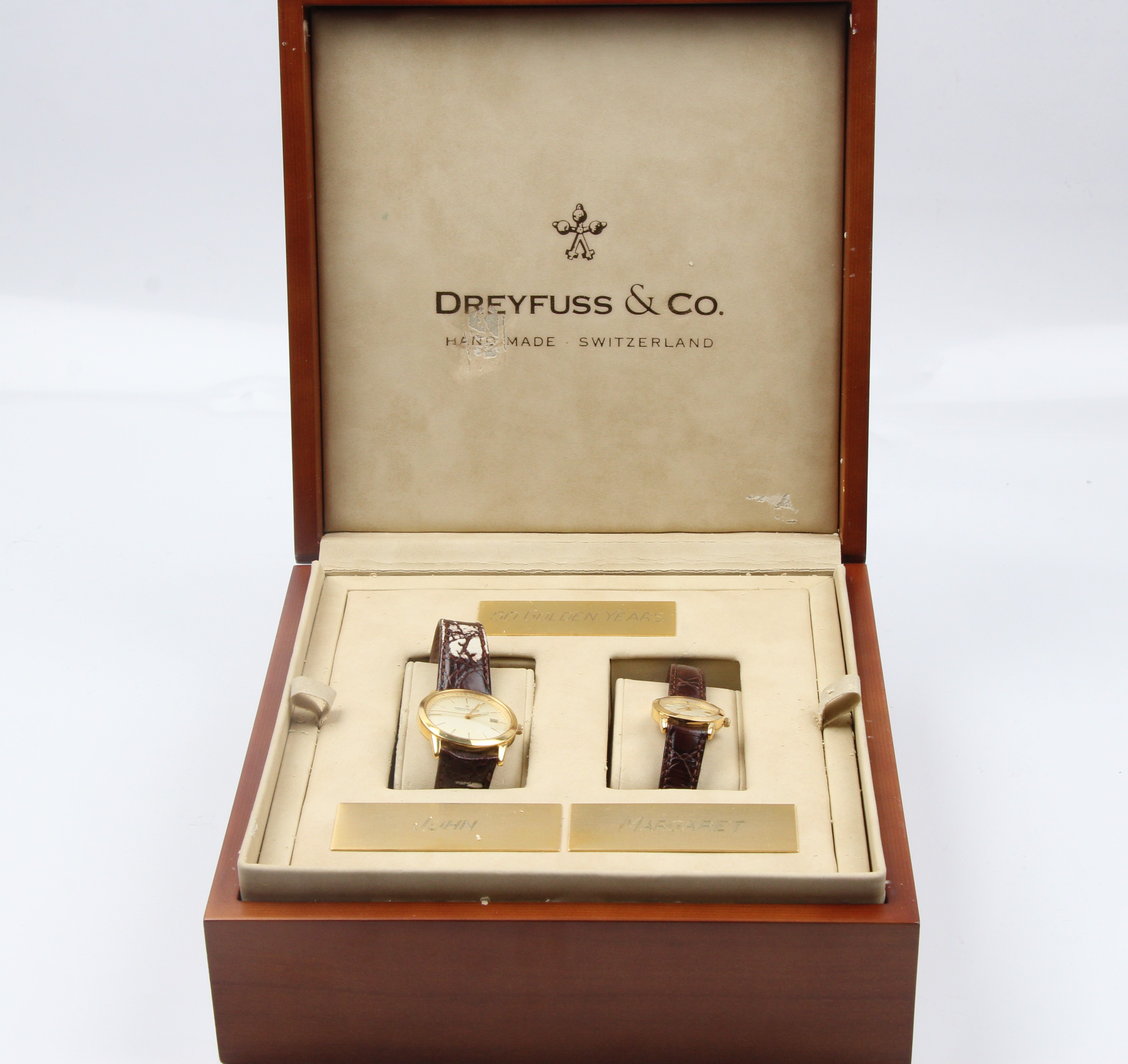 A DREYFUSS & CO. ladies and gents wrist watch set, both having cases stamped 18k, on brown leather