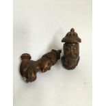 A pair of late nineteenth century, novelty tobacco pipes carved in the form of a bearded gentlemen