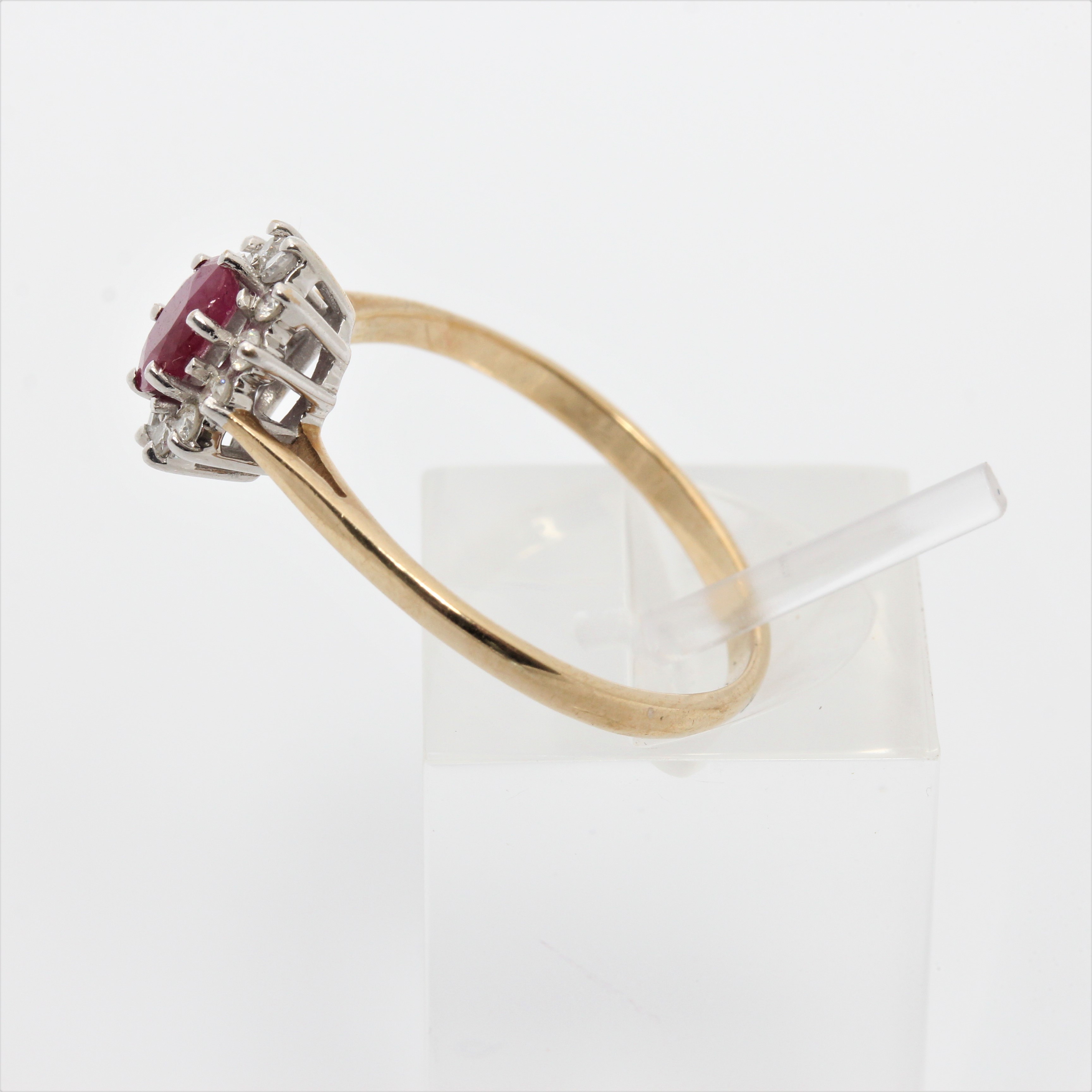 A hallmarked 9ct yellow gold ruby and diamond cluster ring, ring size Q1/2, approx. weight 1.9g. - Image 6 of 7