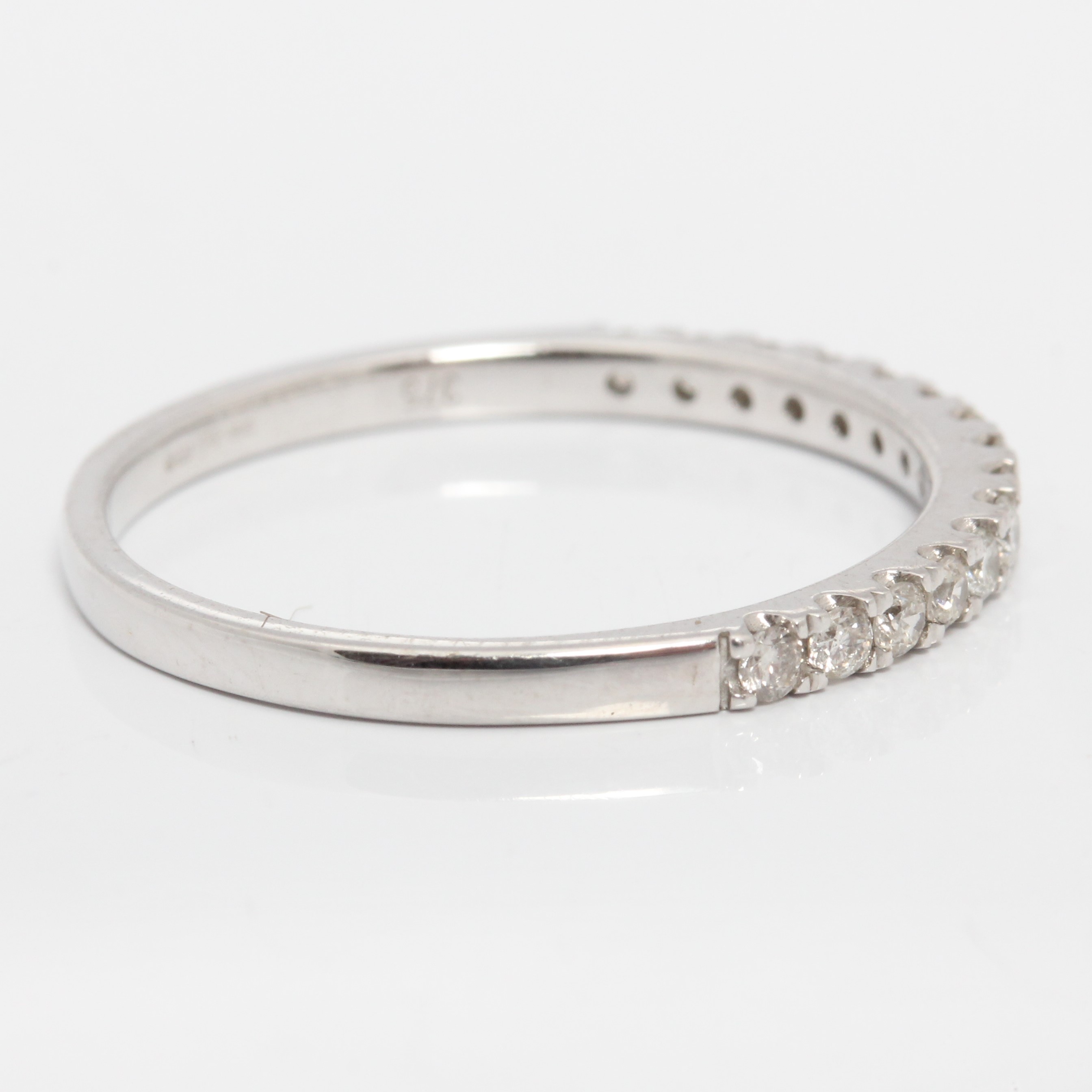 A hallmarked 9ct white gold diamond half eternity ring, set with fifteen round brilliant cut - Image 2 of 4