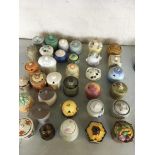 Thirty four individually designed and painted honeypots