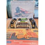 A Mettoy Railway Accessory Set together with a Mettoy Passenger Train Set