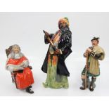 Three Royal Doulton figures to include Blue Bears, The Judge, and The Laird.