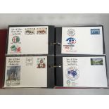 An extensive collection of Isle of Man stamps on FDC,s and Maxi cards 1985 to 2013 in three cover