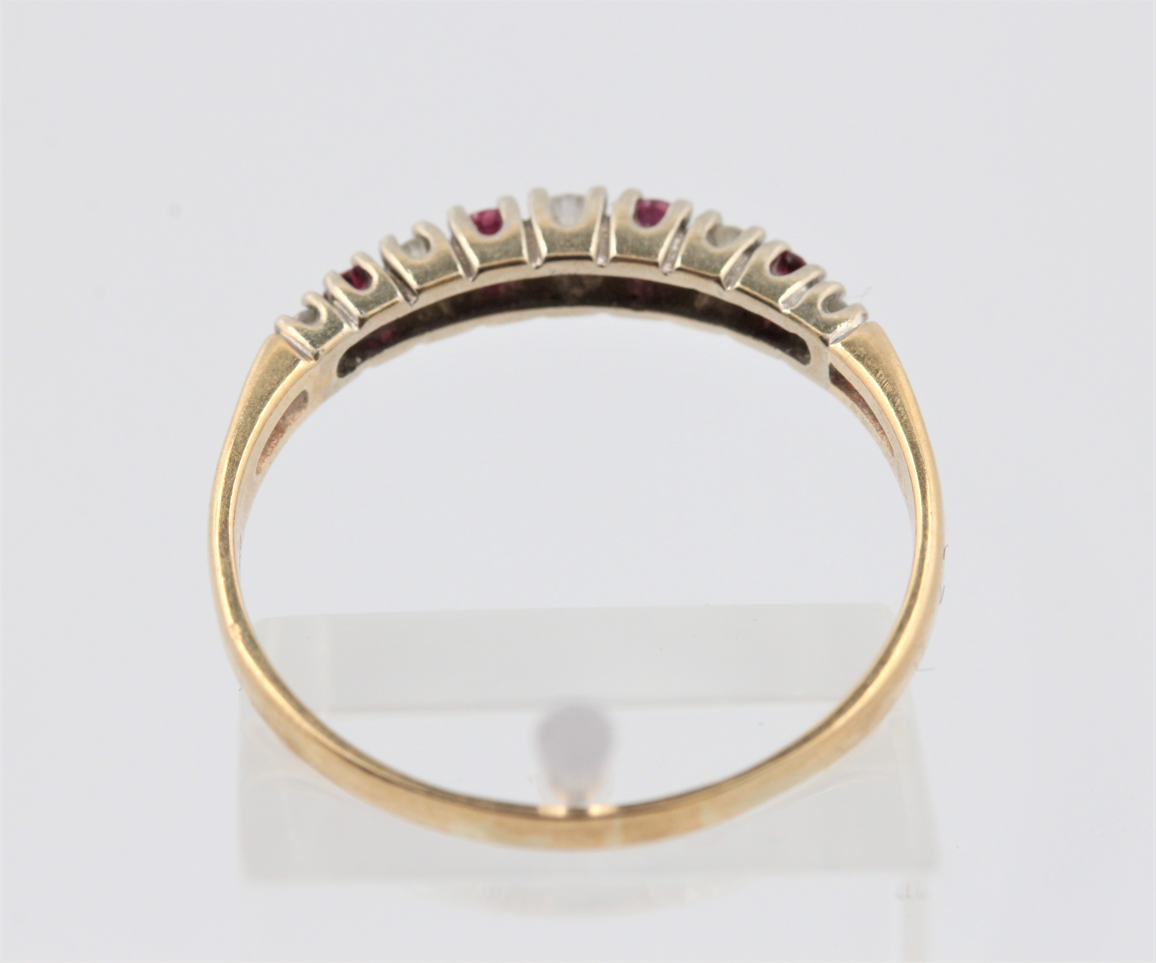 A hallmarked 9ct yellow gold ruby and diamond half eternity ring, ring size Q1/2, approx. weight 1. - Image 3 of 4