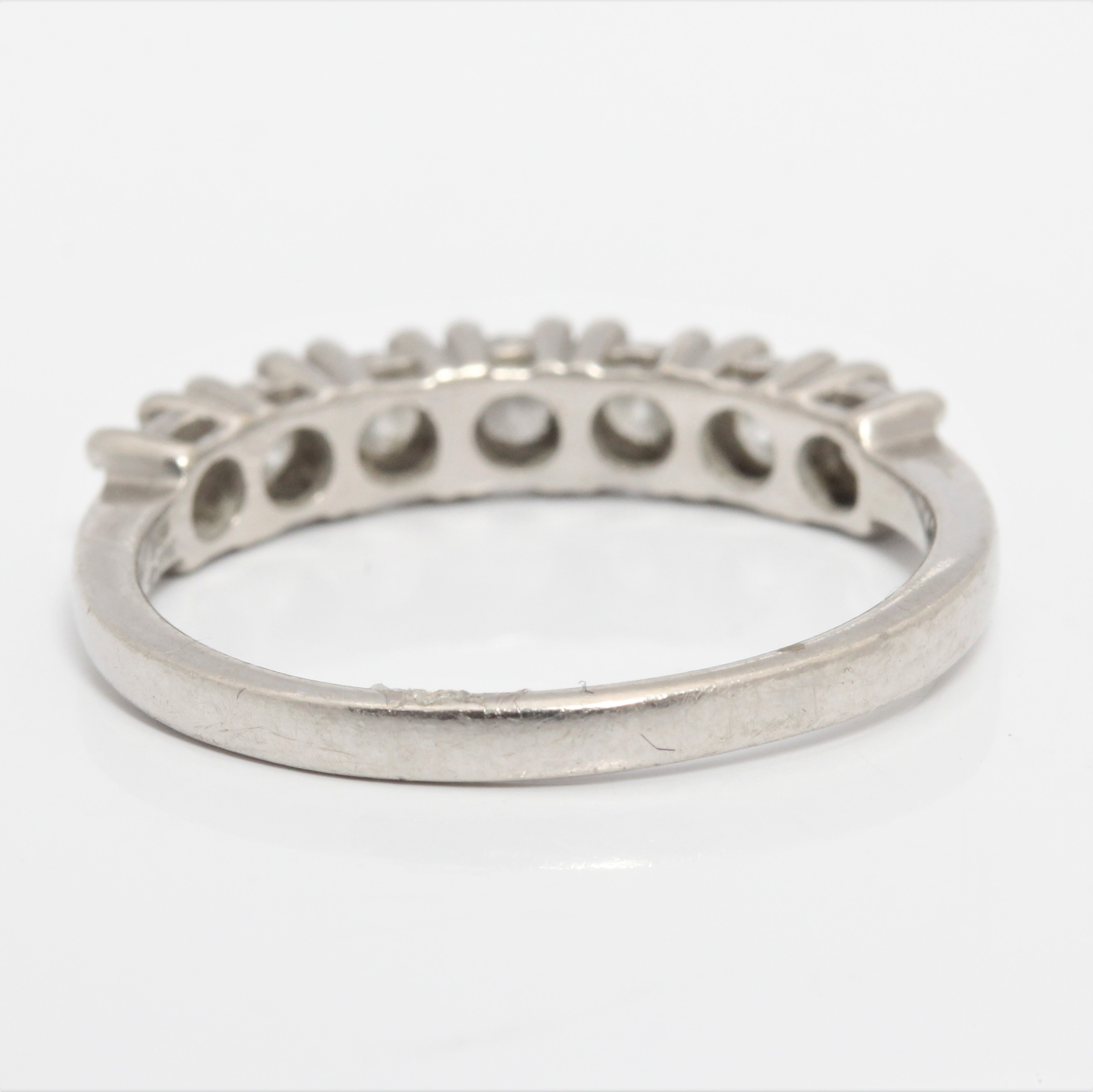 A seven stone diamond half eternity ring, set with seven round brilliant cut diamonds, total diamond - Image 3 of 4