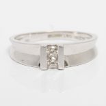 A hallmarked 9ct white gold two stone diamond ring, set with two round brilliant cut diamonds, total