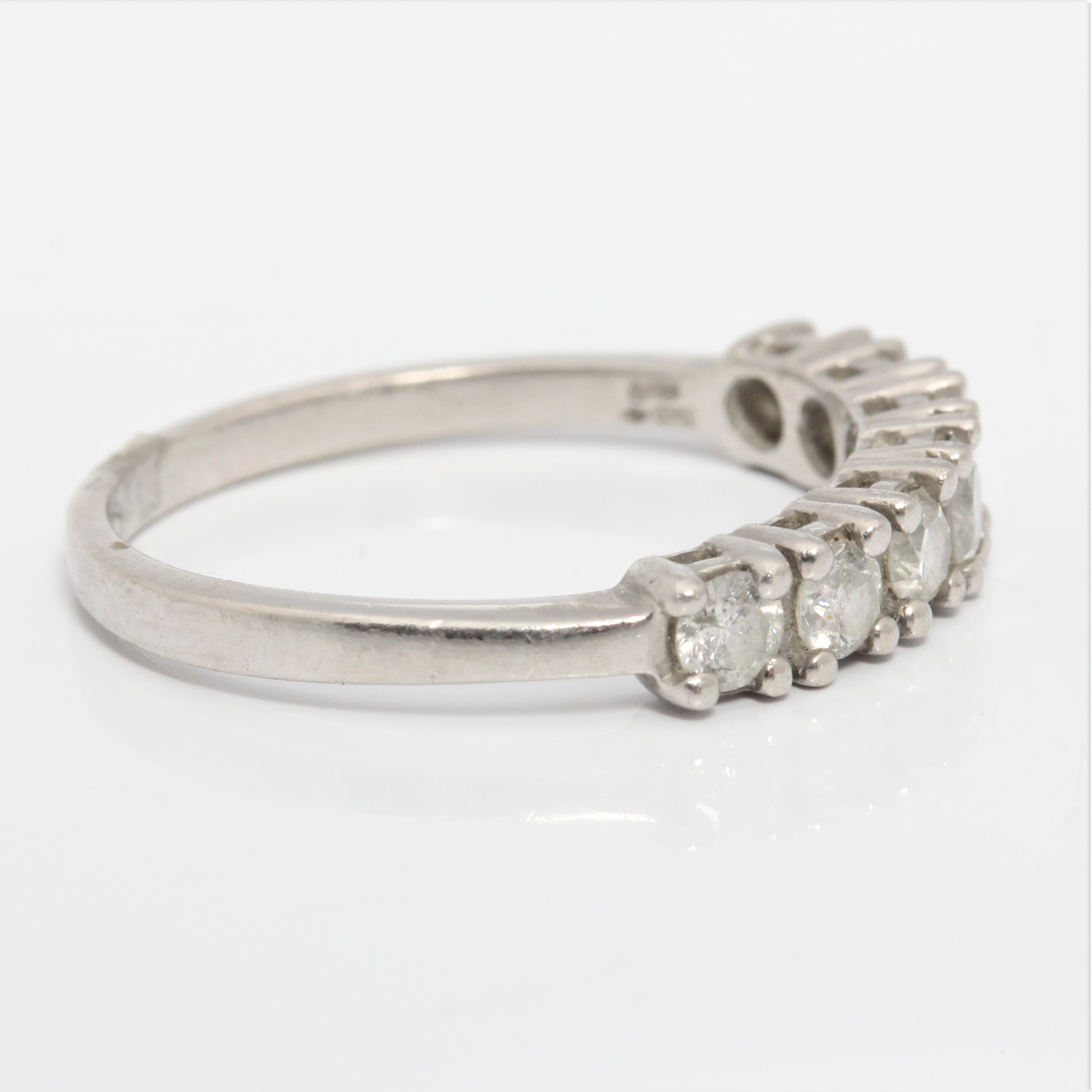 A seven stone diamond half eternity ring, set with seven round brilliant cut diamonds, total diamond - Image 2 of 4