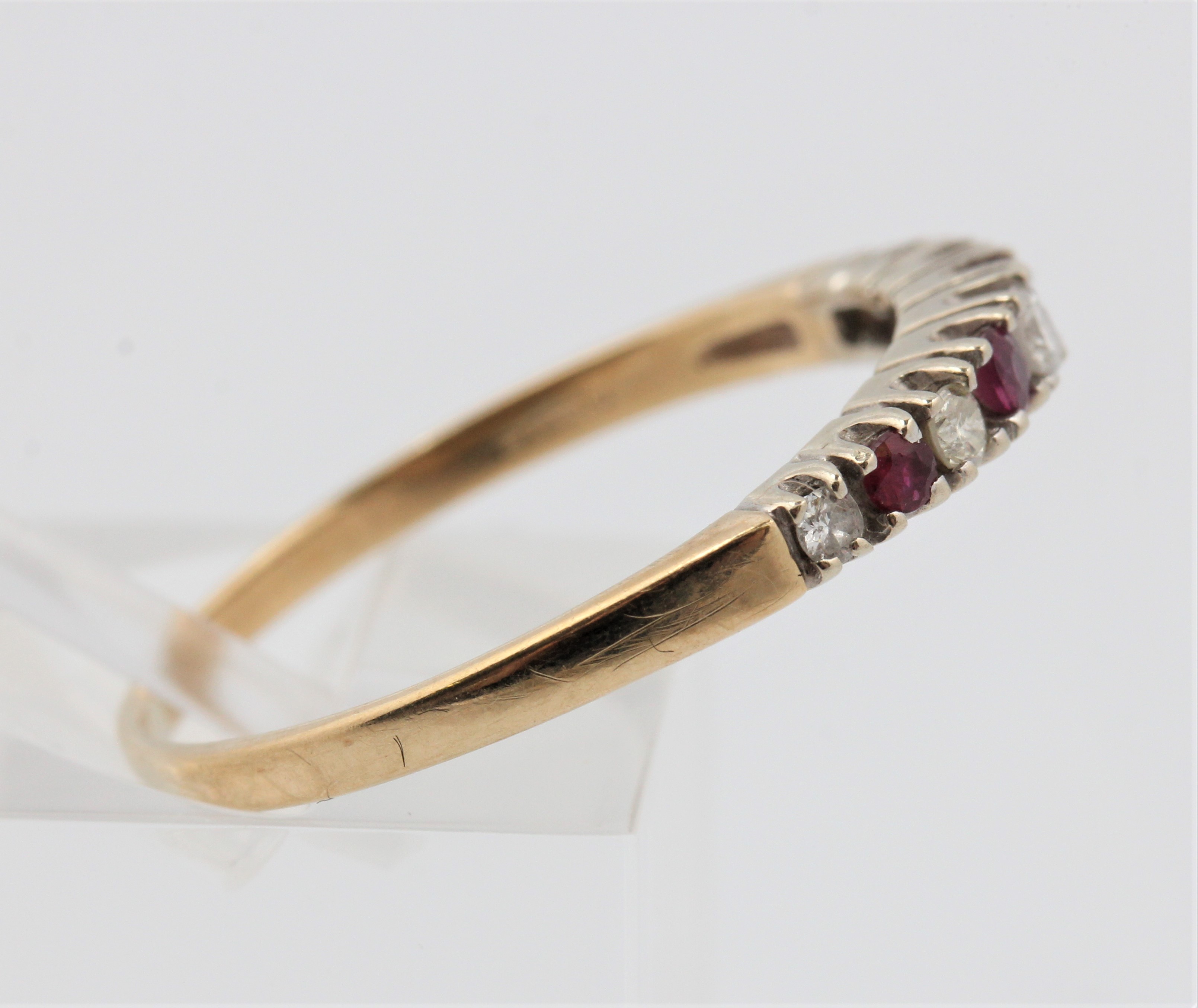 A hallmarked 9ct yellow gold ruby and diamond half eternity ring, ring size Q1/2, approx. weight 1. - Image 2 of 4