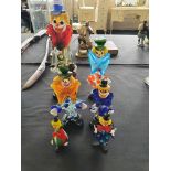 Six glass coloured clowns of various sizes, tallest one approx. height 38cm