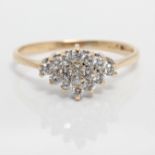 A hallmarked 9ct yellow gold cubic zirconia cluster ring, ring size L 1/2