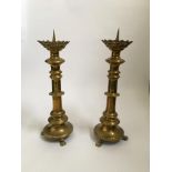 A pair of brass, church altar candlestick holders on claw feet. Approx. height 51cm