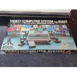 An Atari video computer system, “Woody”