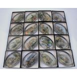 A collection of 16 boxed paperweights depicting iconic Birmingham locations, featuring trams and