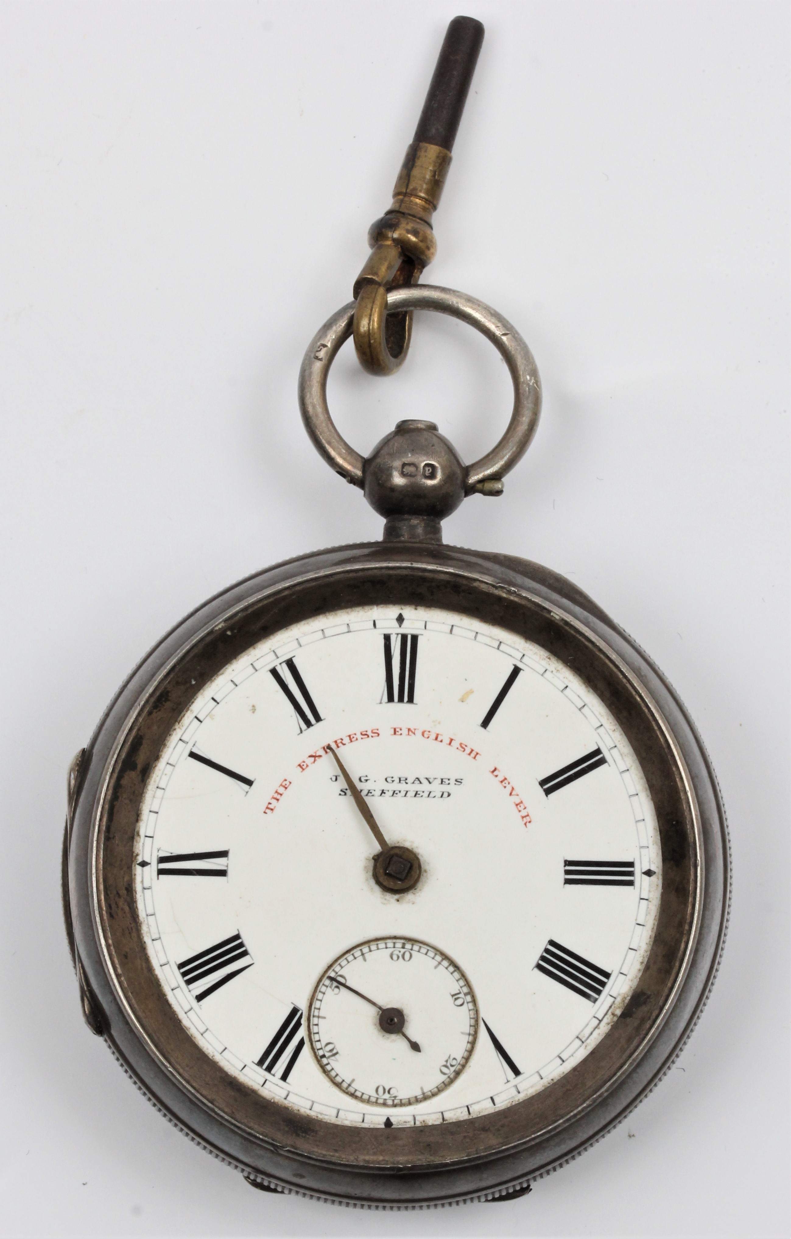 A silver Victorian Graves key wind open face pocket watch, the white enamel dial having hourly Roman