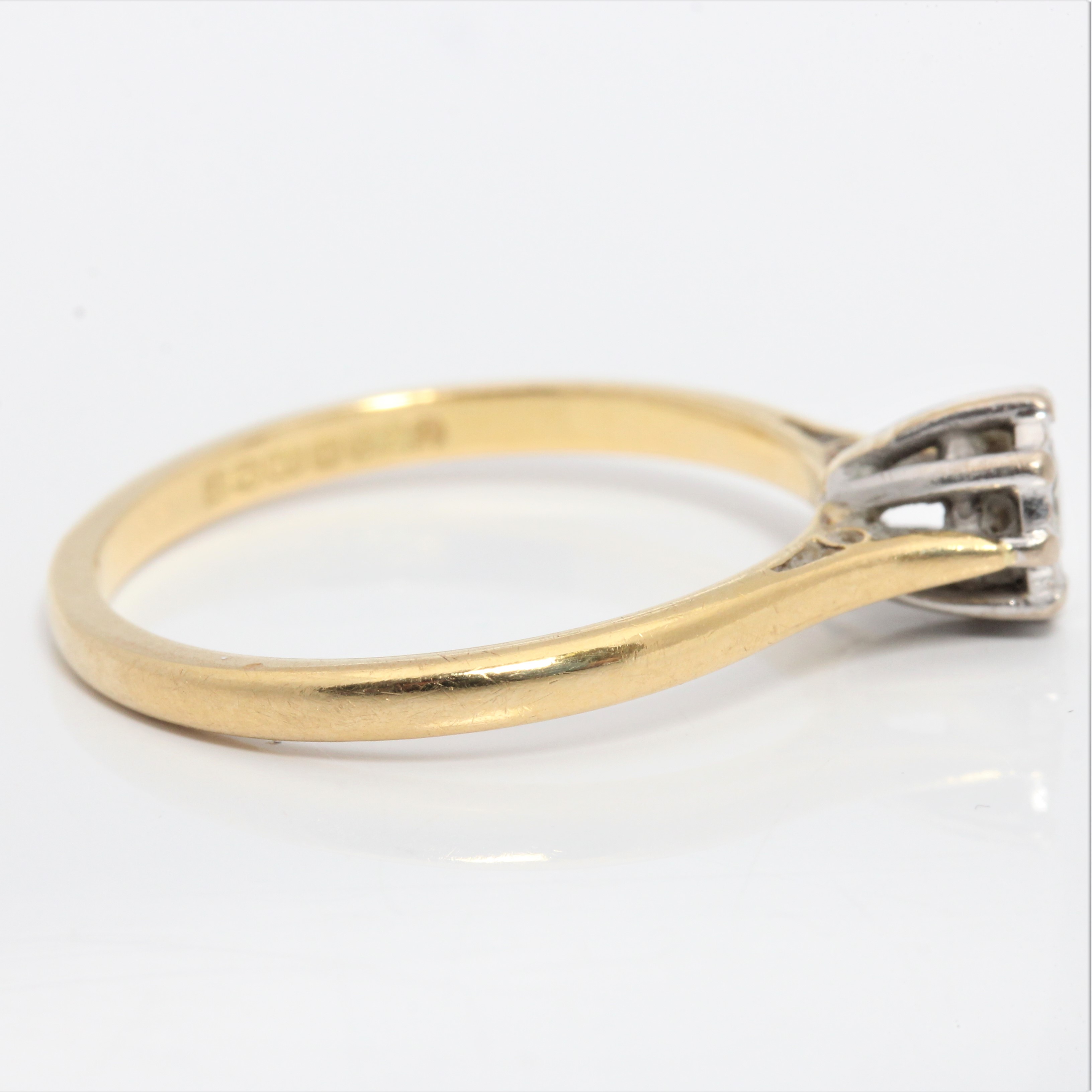 A hallmarked 18ct yellow gold diamond solitaire ring, illusion set with a round brilliant cut - Image 2 of 4