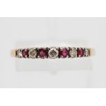 A hallmarked 9ct yellow gold ruby and diamond half eternity ring, ring size Q1/2, approx. weight 1.
