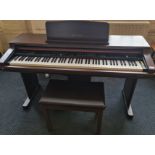 A Technics 'Digital Ensemble' electric piano with stool, model number PR350