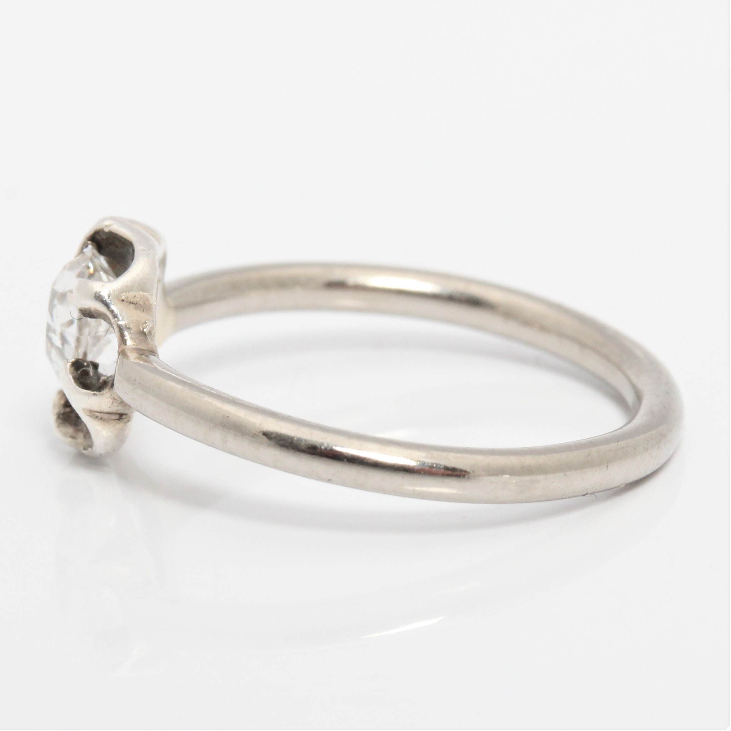 A diamond solitaire ring, set with an old pear cut shaped diamond, measuring approx. 0.45ct, in an - Image 4 of 4