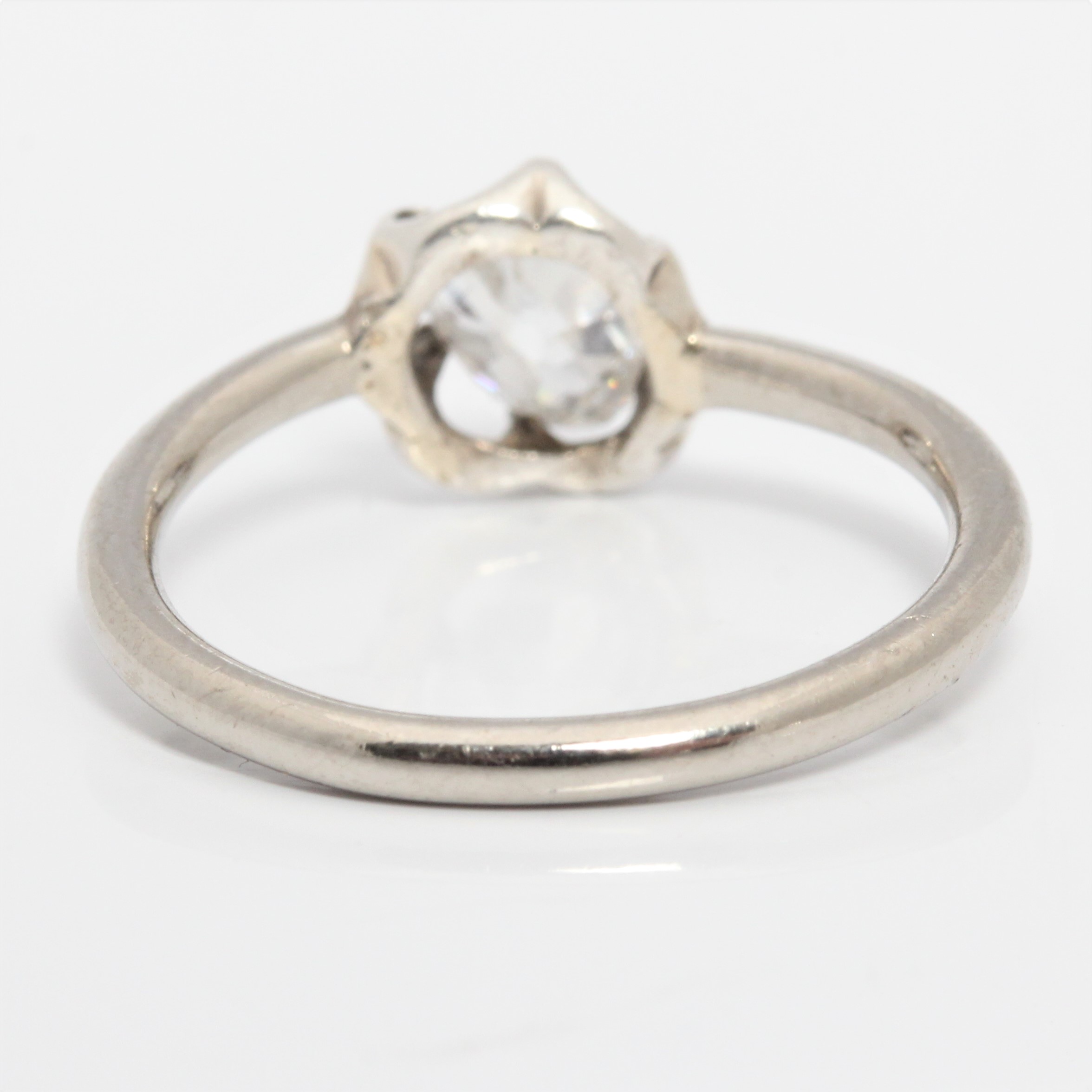 A diamond solitaire ring, set with an old pear cut shaped diamond, measuring approx. 0.45ct, in an - Image 3 of 4