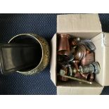 A box containing a quantity of mixed brass and copper ware, including a pair of brass candle sticks,