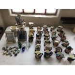 Twenty seven various character jugs, to include twenty four by Royal Doulton together with two