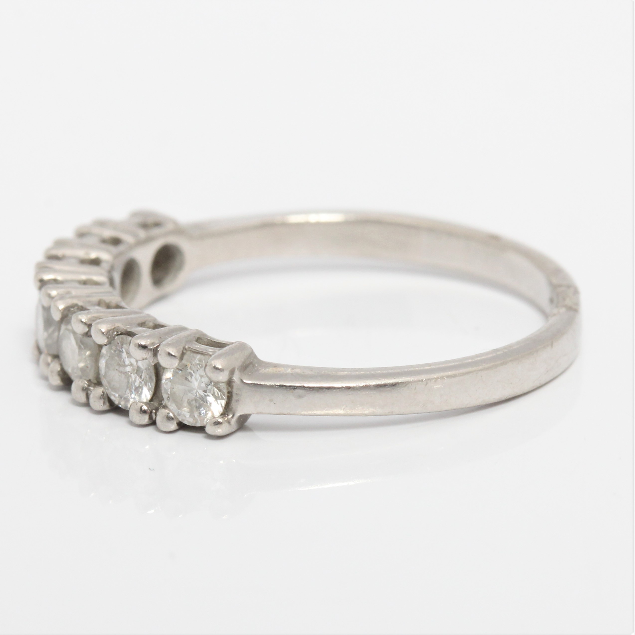 A seven stone diamond half eternity ring, set with seven round brilliant cut diamonds, total diamond - Image 4 of 4