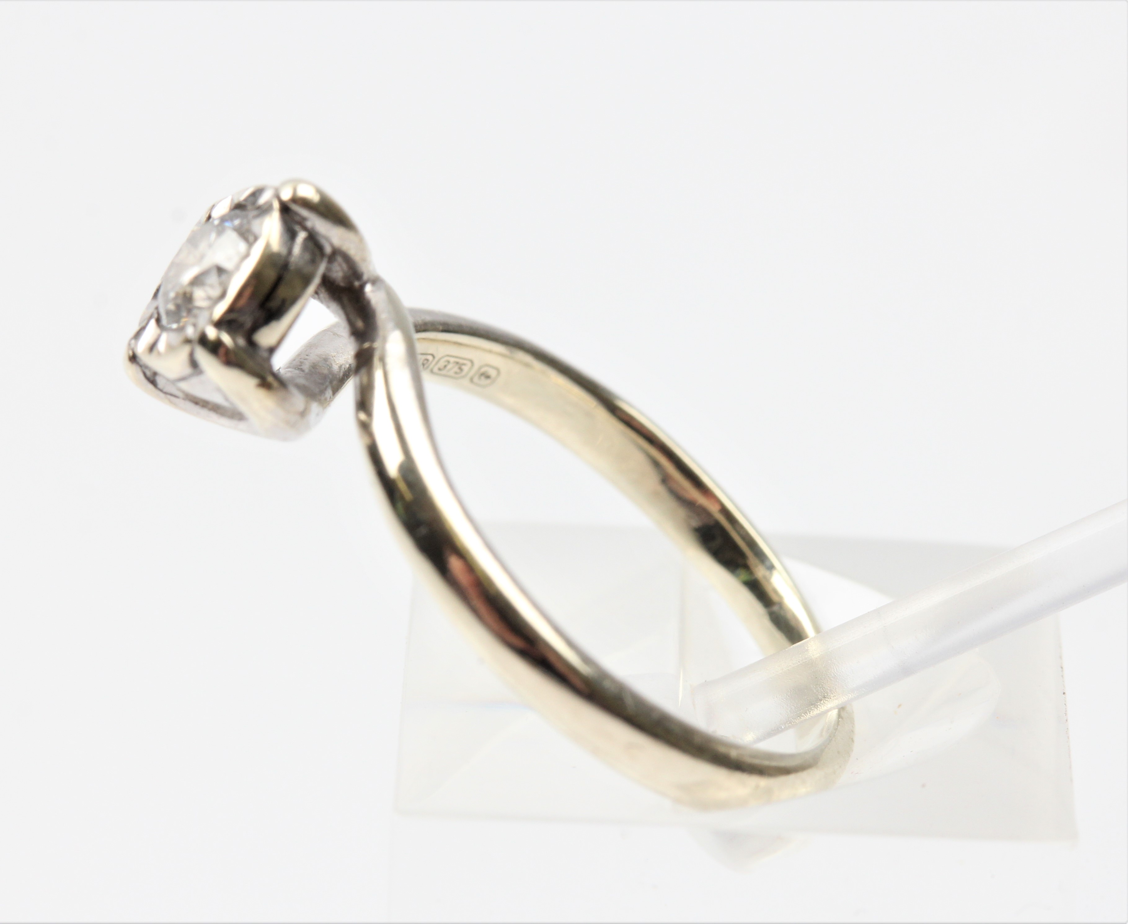 A hallmarked 9ct white gold diamond solitaire ring, illusion set with a round brilliant cut - Image 4 of 4