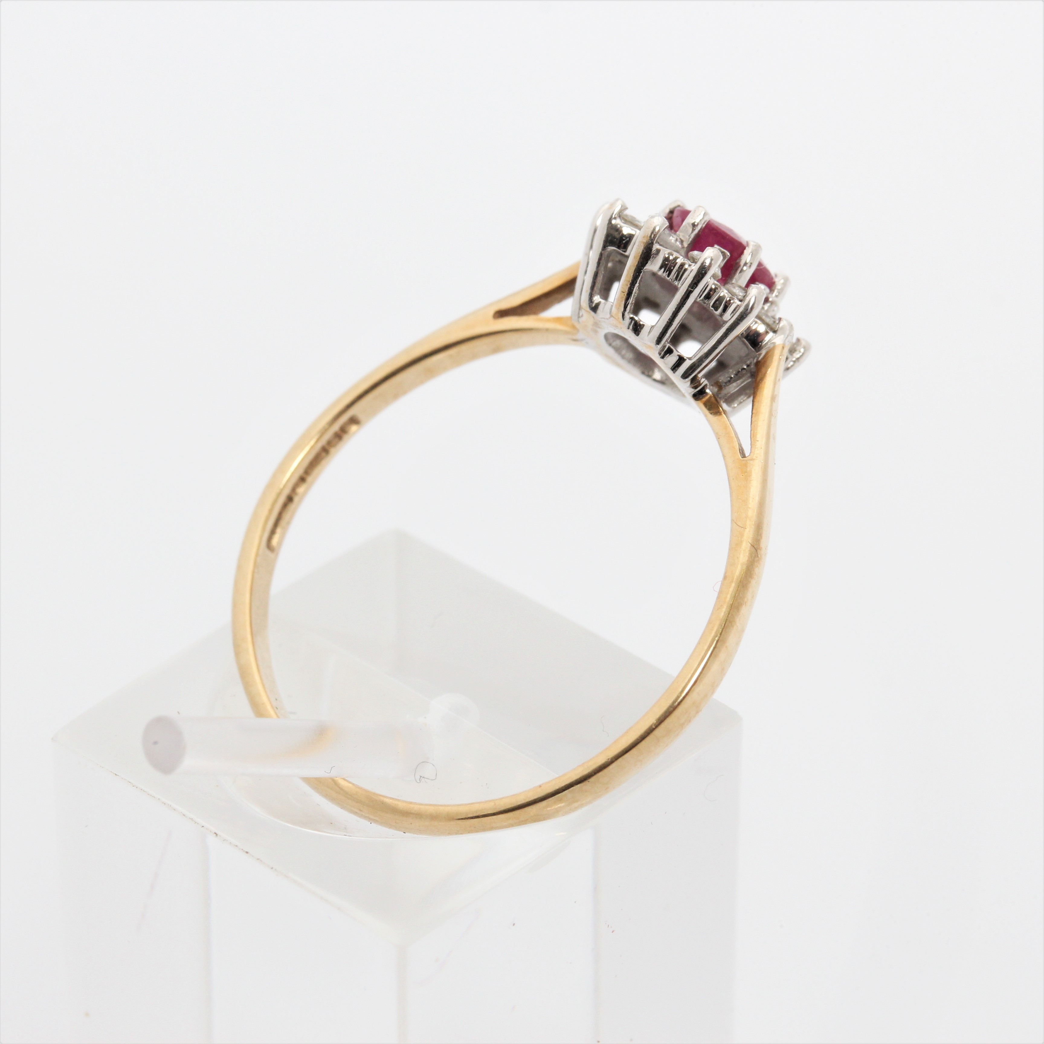A hallmarked 9ct yellow gold ruby and diamond cluster ring, ring size Q1/2, approx. weight 1.9g. - Image 3 of 7