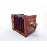 Folding Mahogany Plate Camera. No condition report on this lot, Please View.