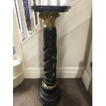 A black and white marble twisted, Grecian style column with brass, approx. height 108cm