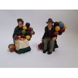 Two Royal Doulton figurines, "the balloon man" together with "the old balloon seller". Approx height