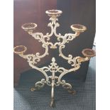 A cast iron, five branch plant pot holder with pierced scroll decoration, approx. height 39.5cm