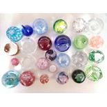 A collection of glass paperweights.