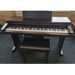 A Technics 'Digital Ensemble' electric piano with stool, model number PR350.
