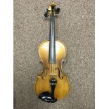 A 3/4 violin in case. Copy of an Antonius Stradivarius West Germany 1950s violin.