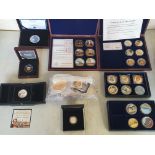 A collection of military themed Commemorative Coins together with 250th Anniversary Of James Cook'