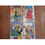 A collection of four Marvel comics, to include the Astonishing Xmen #1, 2, 3, 4.