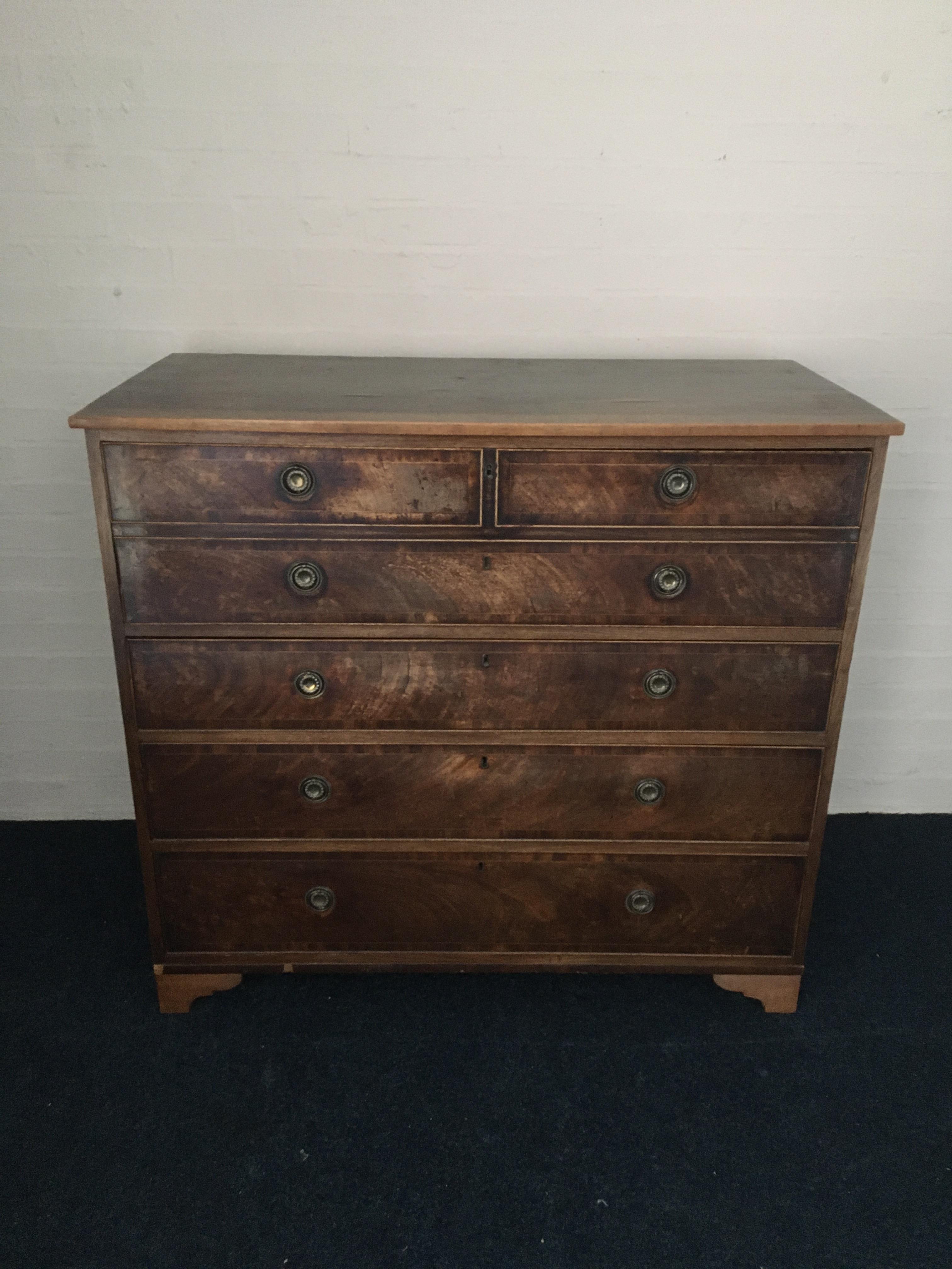 A mahogany, nineteenth century chest of four long drawers.
