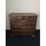 A mahogany, nineteenth century chest of four long drawers.