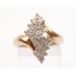 A diamond cluster ring, set with nineteen round brilliant cut diamonds in wave design, total diamond