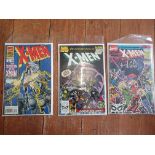 Three Marvel comics, to include Xmen annuals #3,13,14.