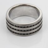 A black stone set band, ring size U.