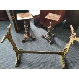 Two Victorian, cast iron dolphin design pub table bases, with an oblong, cast iron pub table base