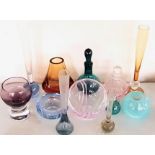 A collection of coloured glassware to include, flute vases, bowls, vases.