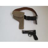 A Webley ‘Junior’ air pistol with a canvas 1944 gun holster and St John’s Ambulance belt.