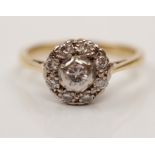 A diamond cluster ring, set with round brilliant cut diamonds, total diamond weight approx. 0.