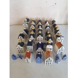 A collection of KLM houses together with Dutch Hand painted houses and others.